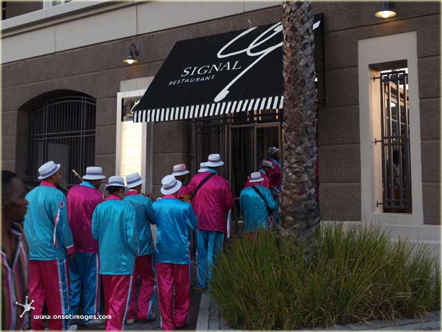 Woodstock StarLites Minstrels entering the SIGNAL Restaurant